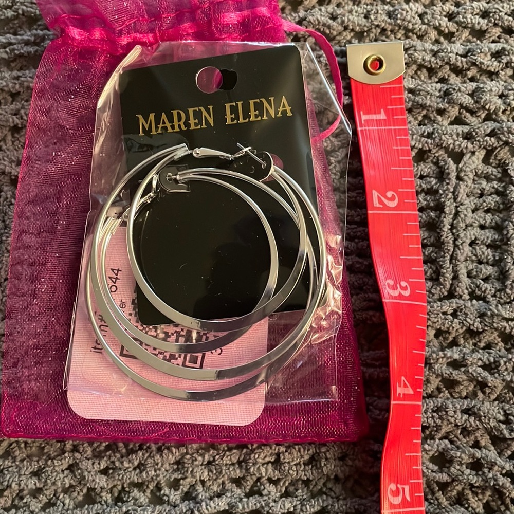 Maren Elena silver hoop earrings. New in package.